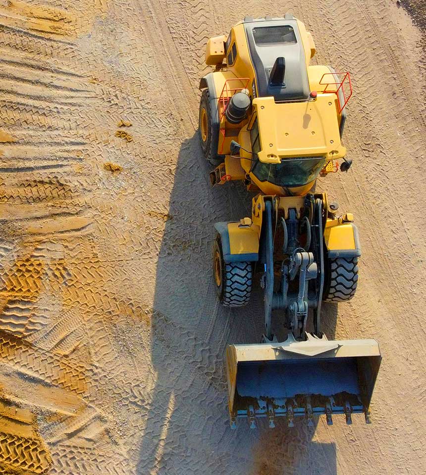 Excavator at Construction Site  Rey Toro Group Excavator at Construction Site